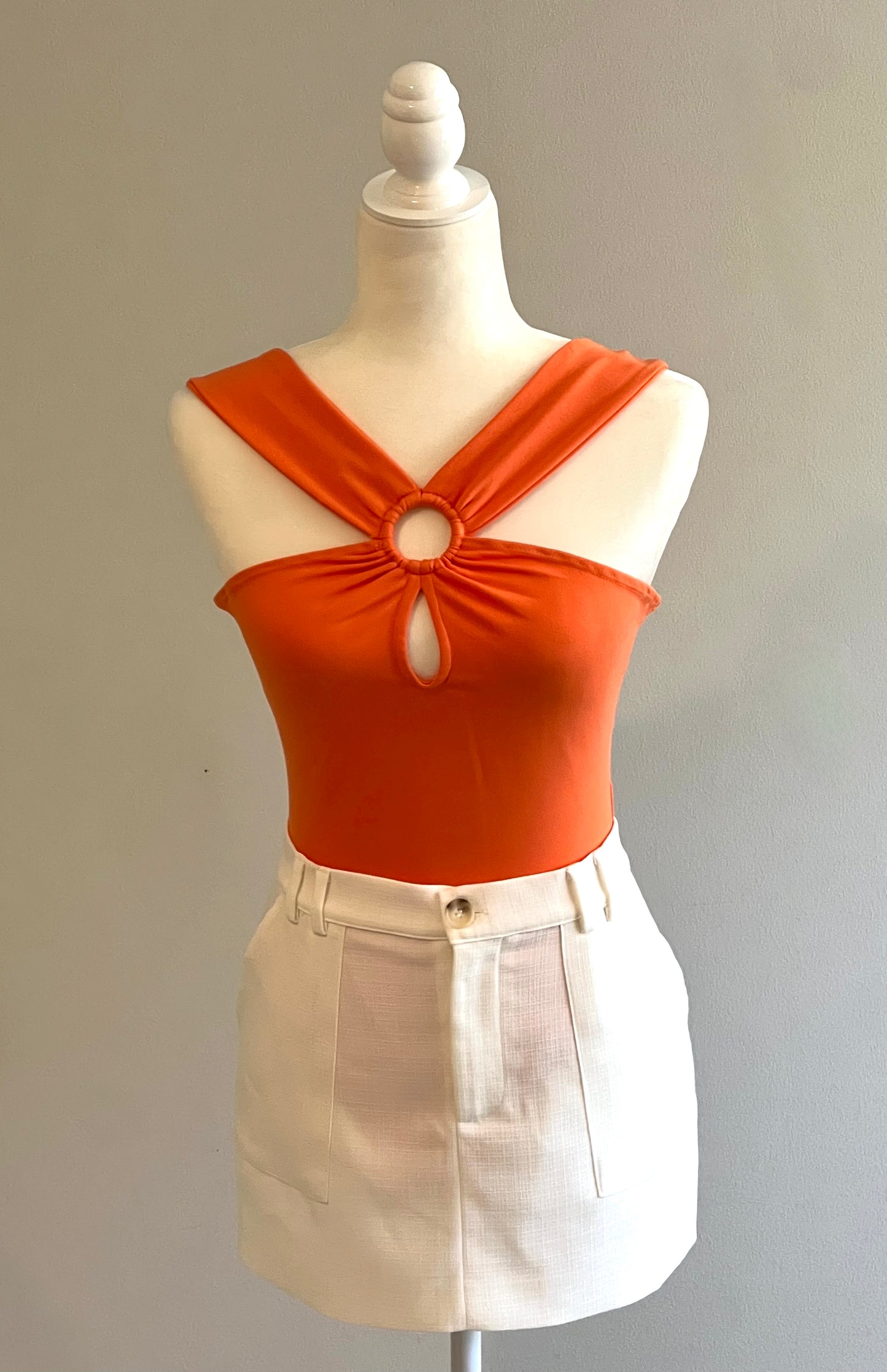 ORANGE CROSSED BODYSUIT