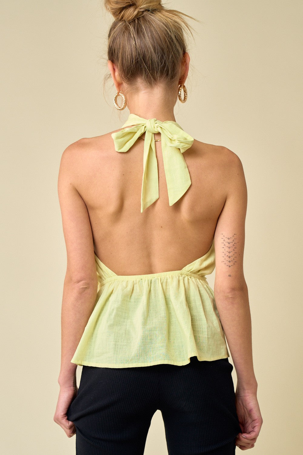 YELLOW TWISTED HALTER TOP